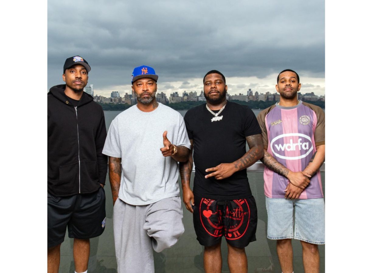 Joe with some of his podcast co-hosts (Image via Instagram/ @joebudden)