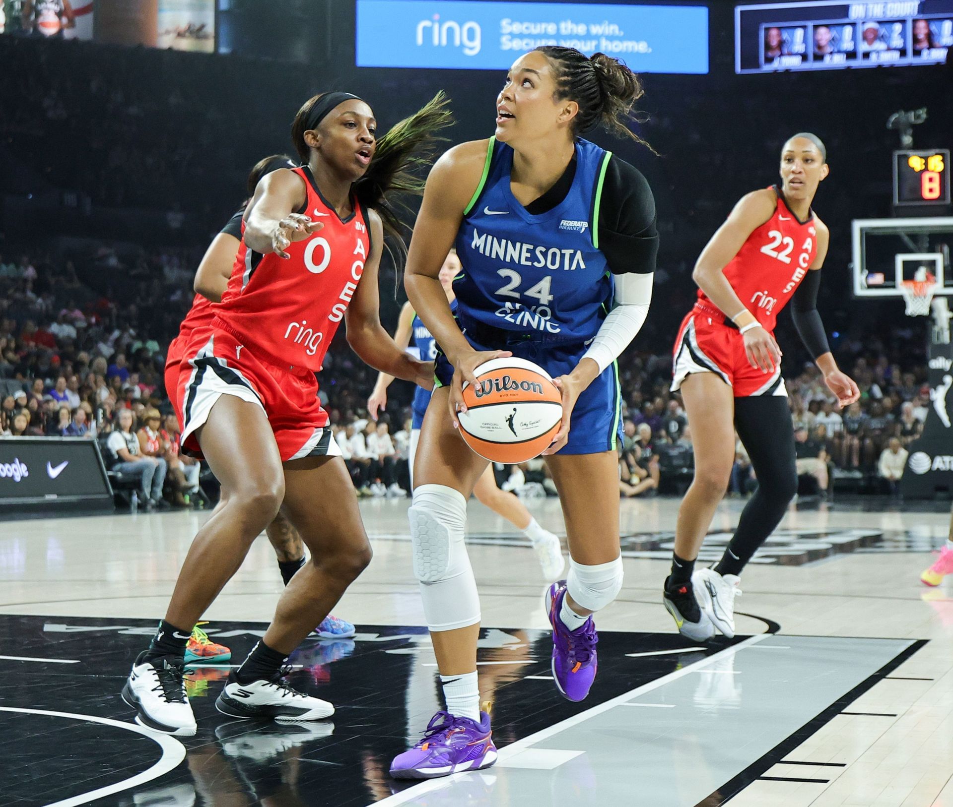 Napheesa Collier #24 of the Minnesota Lynx drives to the basket against Jackie Young #0 of the Las Vegas Aces in the first quarter of their game at Michelob ULTRA Arena on August 02, 2025, in Las Vegas, Nevada. - Source: Getty