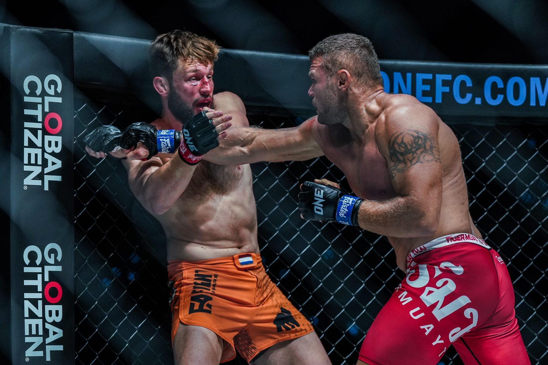 Anatoly Malykhin (R) beats up Reinier de Ridder in their first meeting | Photo credit: ONE Championship