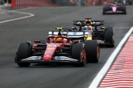 Max Verstappen chasing down Lewis Hamilton at the Hungarian Grand Prix - Source: Getty