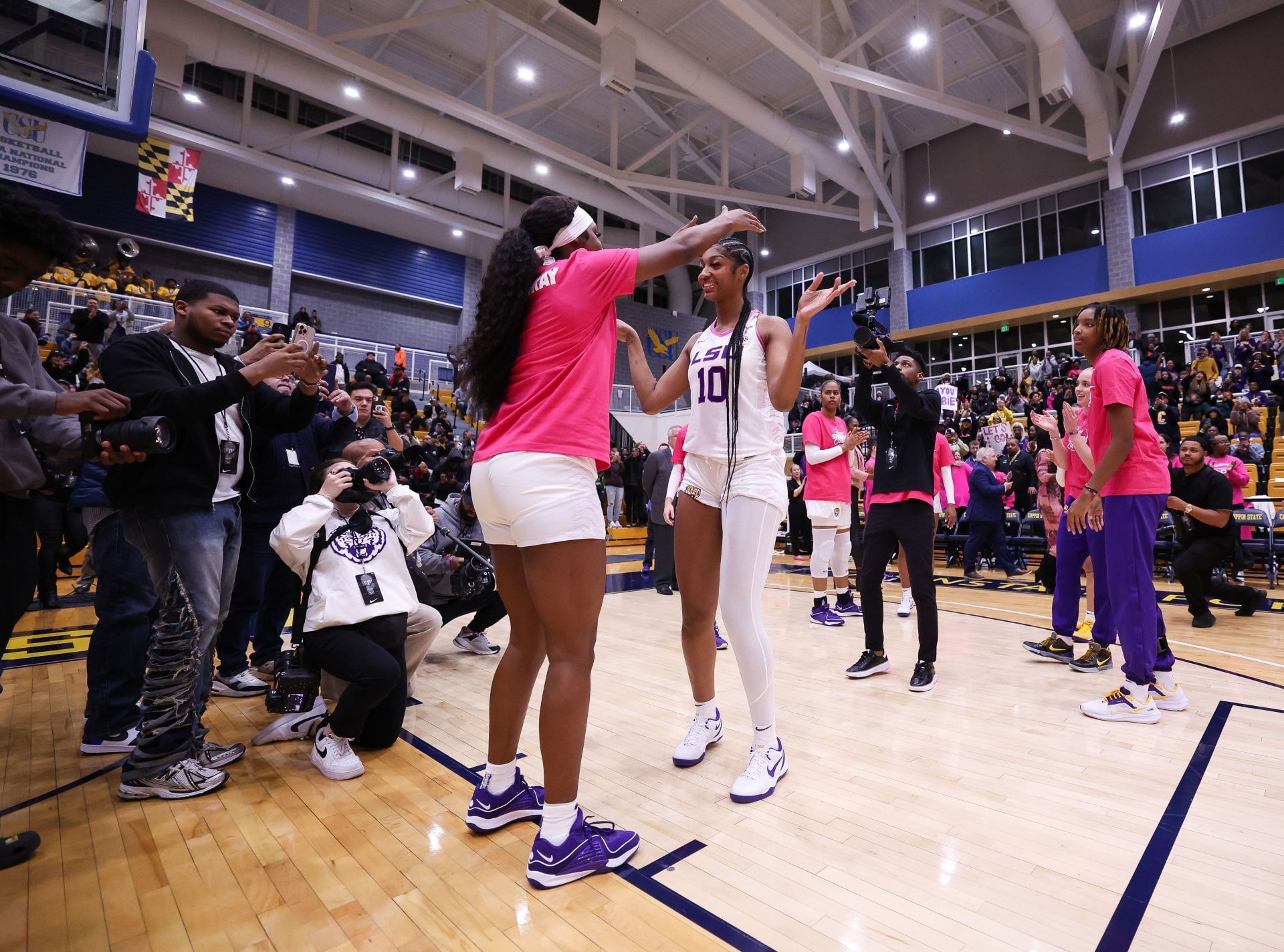 Angel Reese and Aneesah Morrow of LSU before the start of the NCAA Women&#039;s Basketball game between LSU Lady Tigers (80) and Coppin State Eagles (48) at the Coppin State Physical Education Complex on December 20th, 2023 in Baltimore, Maryland. (Photo by Simon Bruty/Anychance/Getty Images)