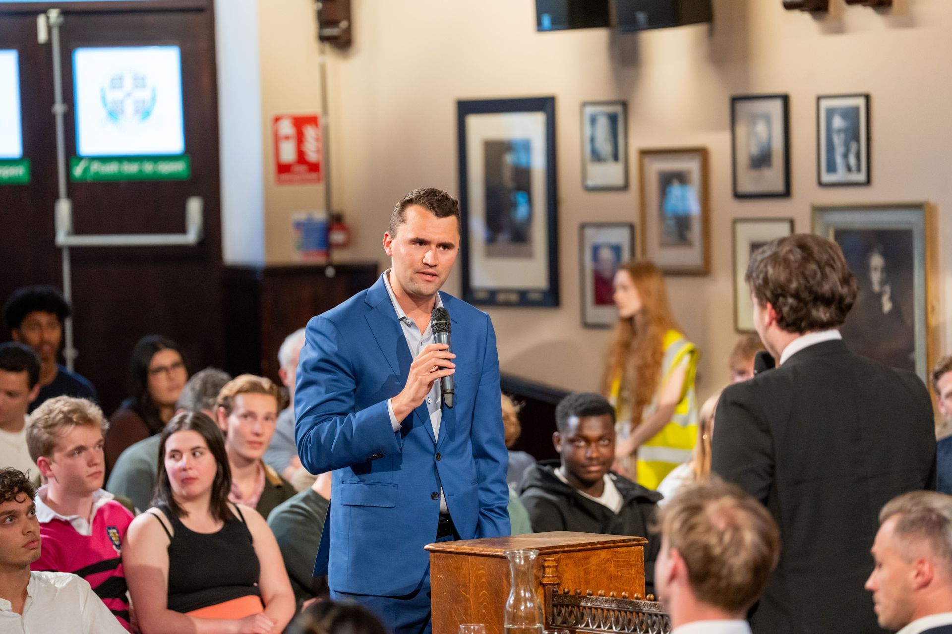 Charlie Kirk speaks at the Cambridge Union (Image via Getty)