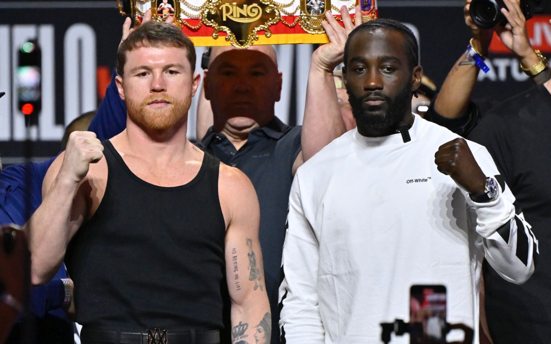 Canelo Alvarez (left) on Terence Crawford