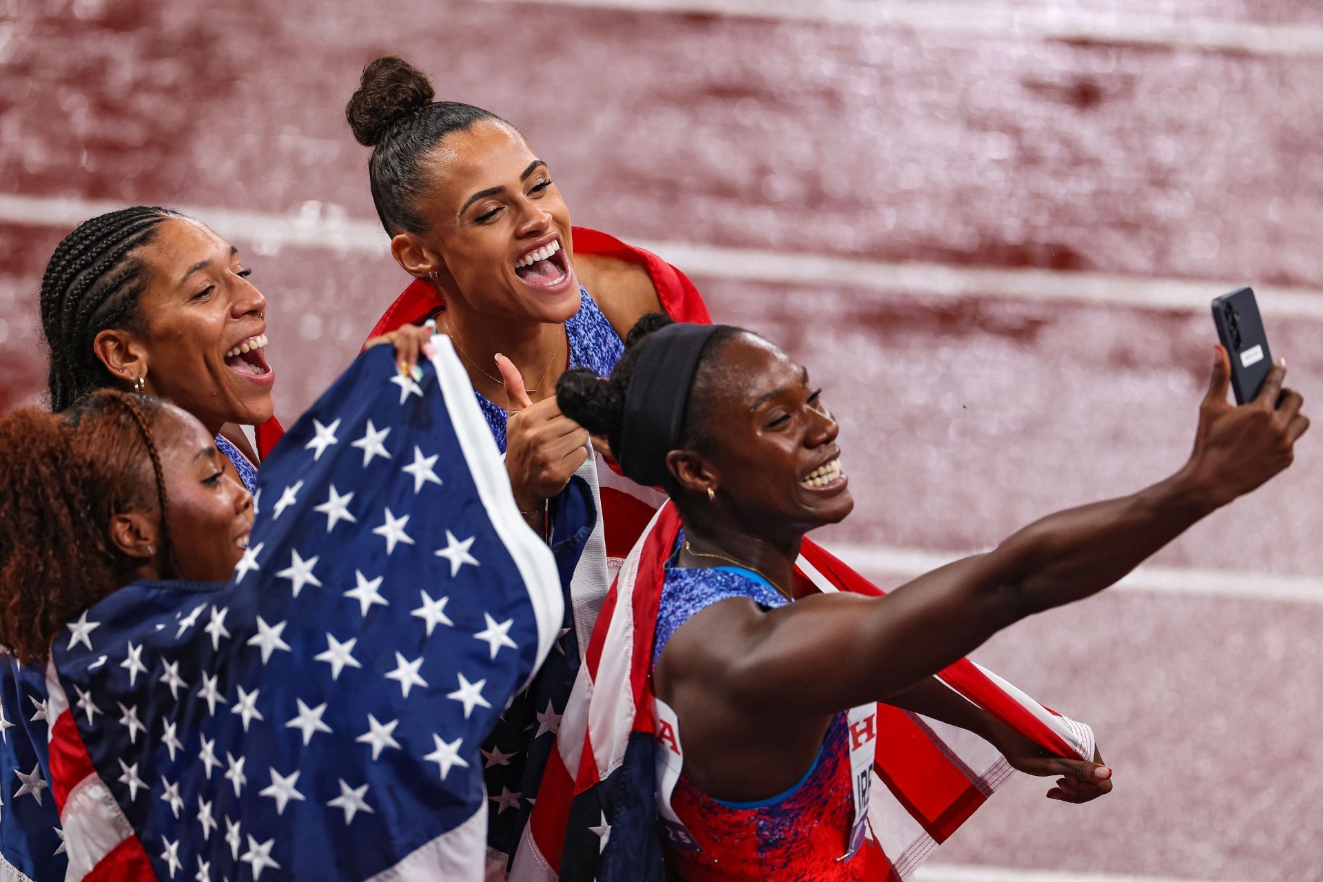 Sydney McLaughlin-Levrone with 4x400m relay team at  World Athletics Championships Tokyo 2025 - Source: Getty