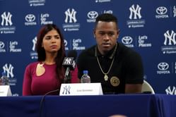 Luis Severino's wife Rosmaly turns heads in sleeveless crop top and high-waisted joggers at Raley Field, shares sweet kiss with the Athletics star