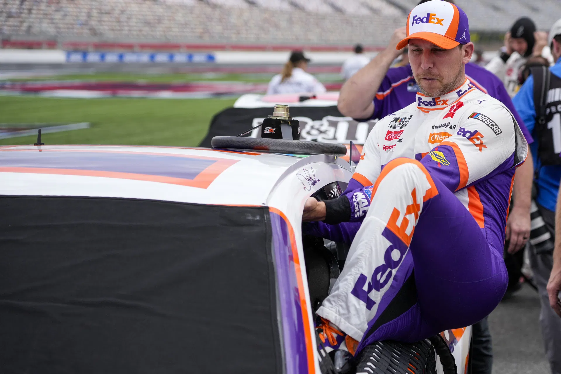 Denny Hamlin (11) gets in his car during qualifying for the Coca-Cola 600. Source: Imagn