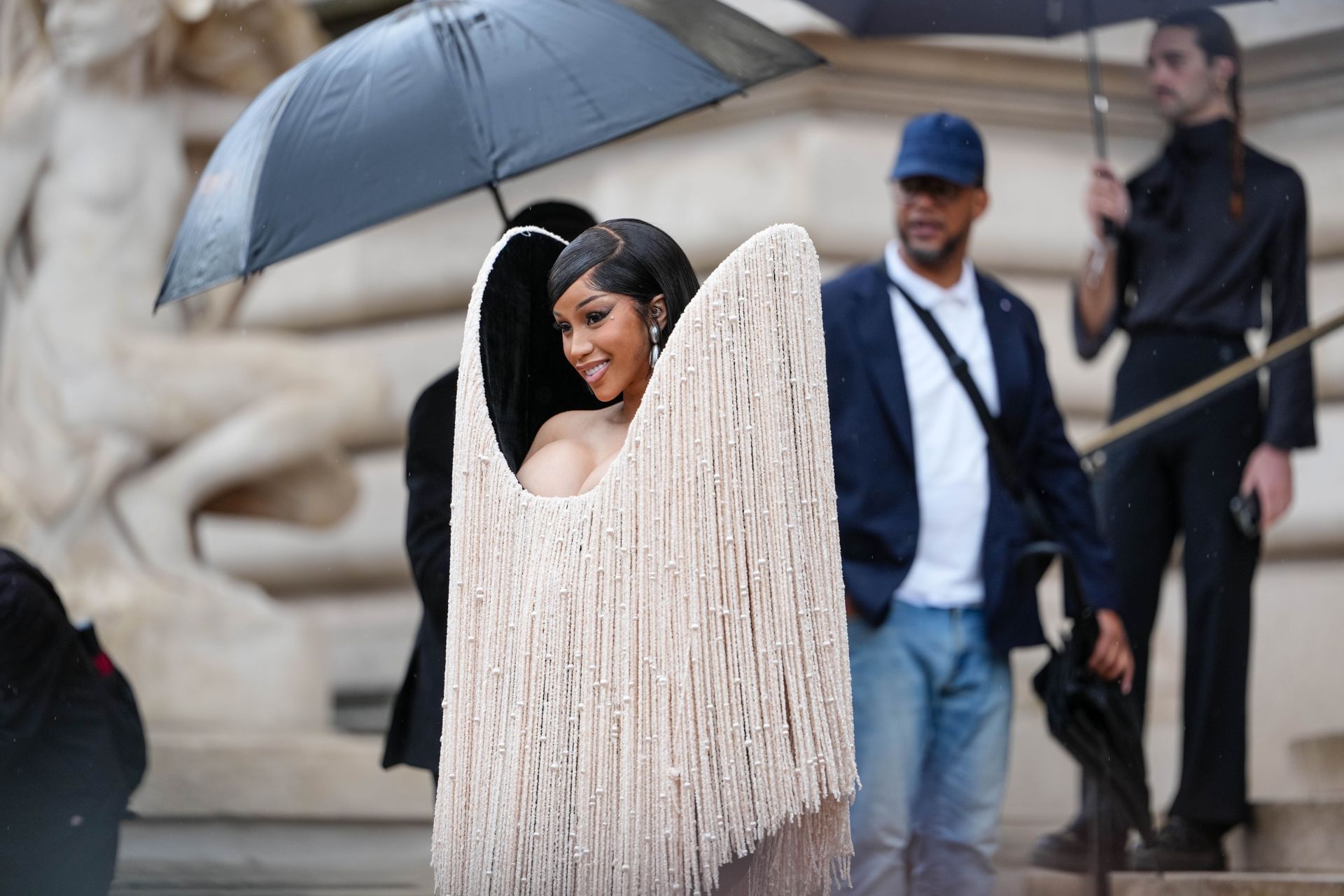 Cardi B at the Paris Fashion Week in July 2025 (Image via Getty)
