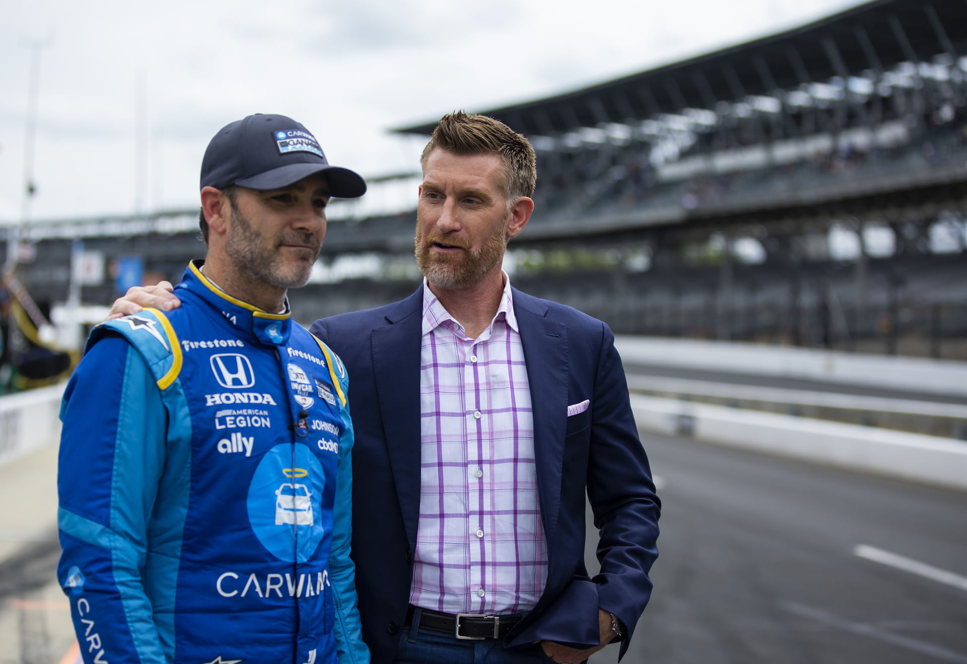 Jimmie Johnson (left) and Marty Smith (right) - Source: Imagn