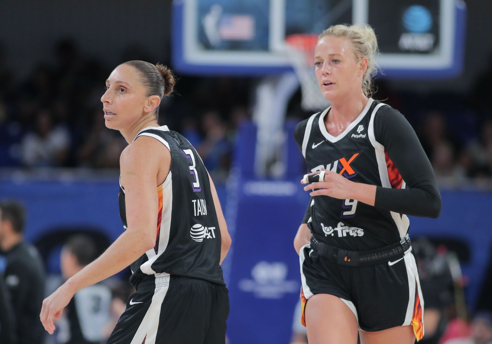 Phoenix Mercury guard Diana Taurasi (3) and Phoenix Mercury guard Sophie Cunningham (9) looks on during a WNBA game between the Phoenix Mercury and the Chicago Sky on July 30, 2023, at Wintrust Arena in Chicago, IL. (Photo by Melissa Tamez/Icon Sportswire via Getty Images)