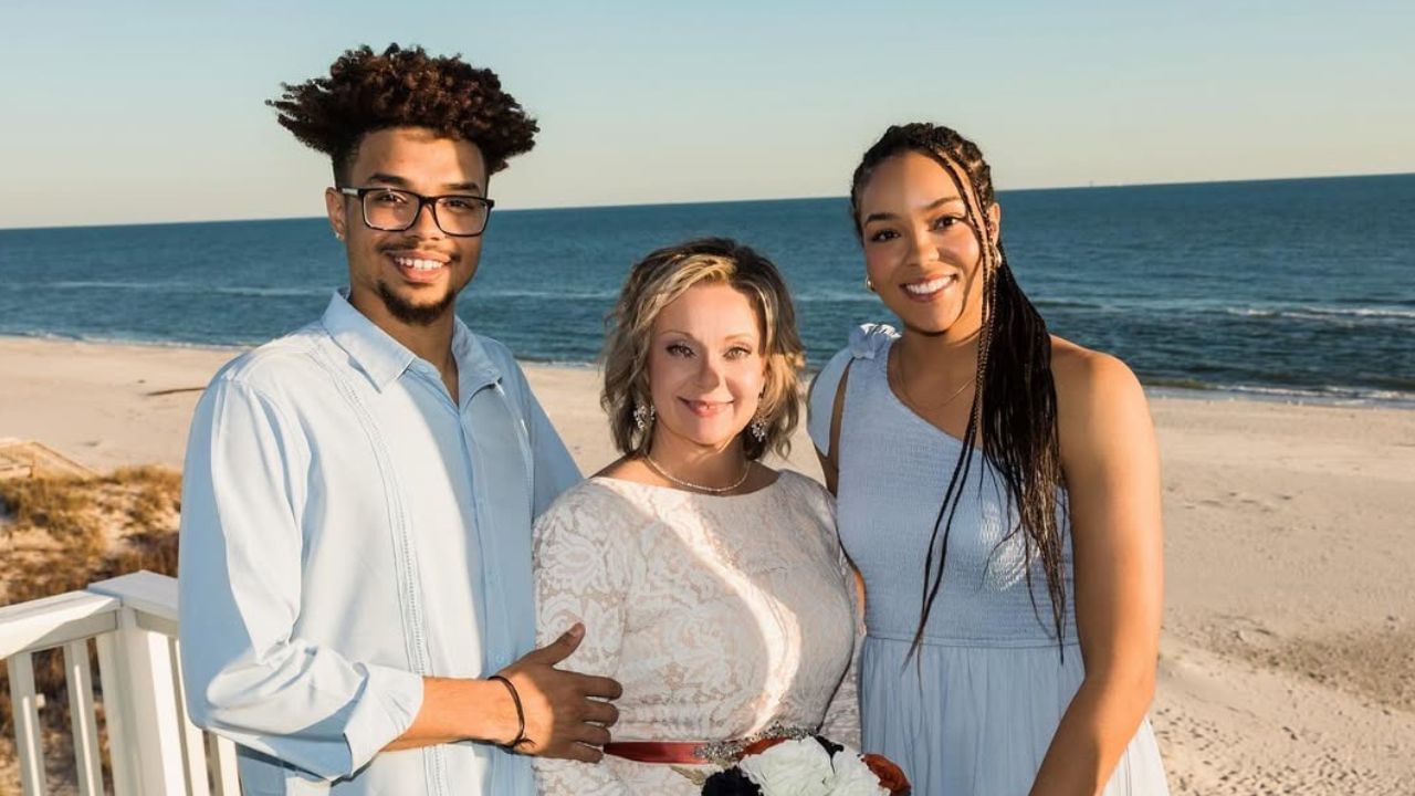Napheesa Collier with her mother and brother