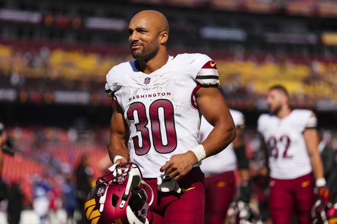 Austin Ekeler injury: Commanders RB suffers Achilles tear after going down vs. Packers on TNF