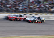Martin Truex Jr. (19) and Chase Briscoe (14) during the 2024 Iowa Corn 350. Source: Imagn