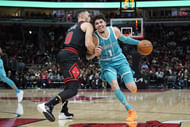 Chicago Bulls guard Zach LaVine (8) defends Charlotte Hornets guard LaMelo Ball (1) during the second half at United Center. - Source: Imagn