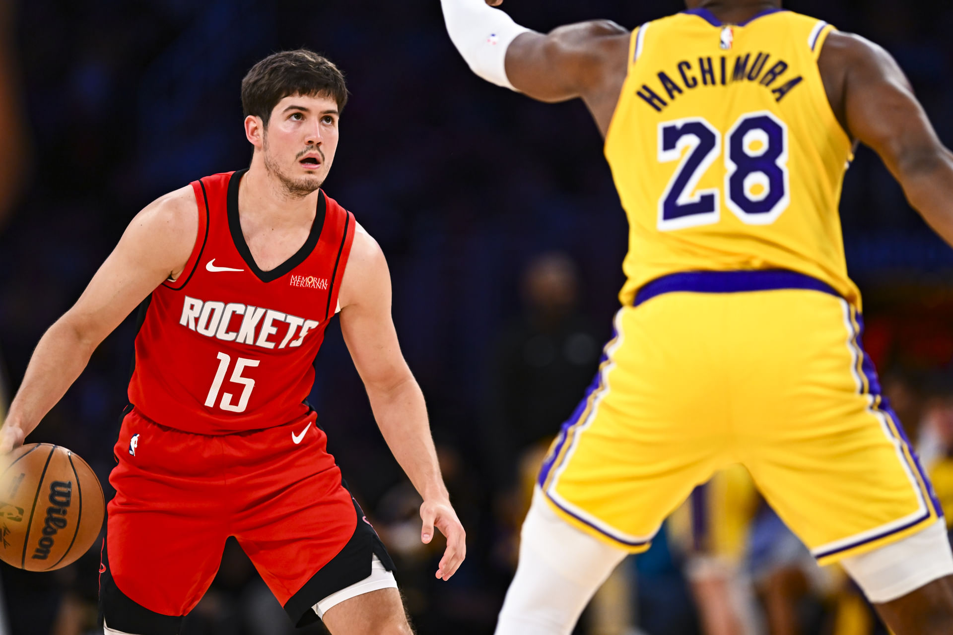 Houston Rockets guard Reed Sheppard (15) looks to shoot against Los Angeles Lakers forward Rui Hachimura (28) during the second half at Crypto.com Arena. Mandatory Credit: Jonathan Hui-Imagn Images