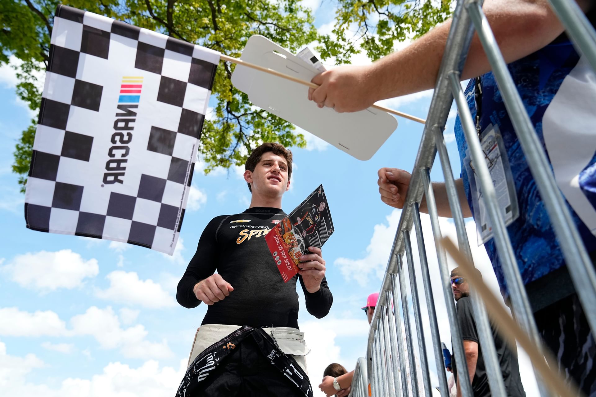 Nick Sanchez signs autographs at the Indianapolis Motor Speedway. Source: Imagn