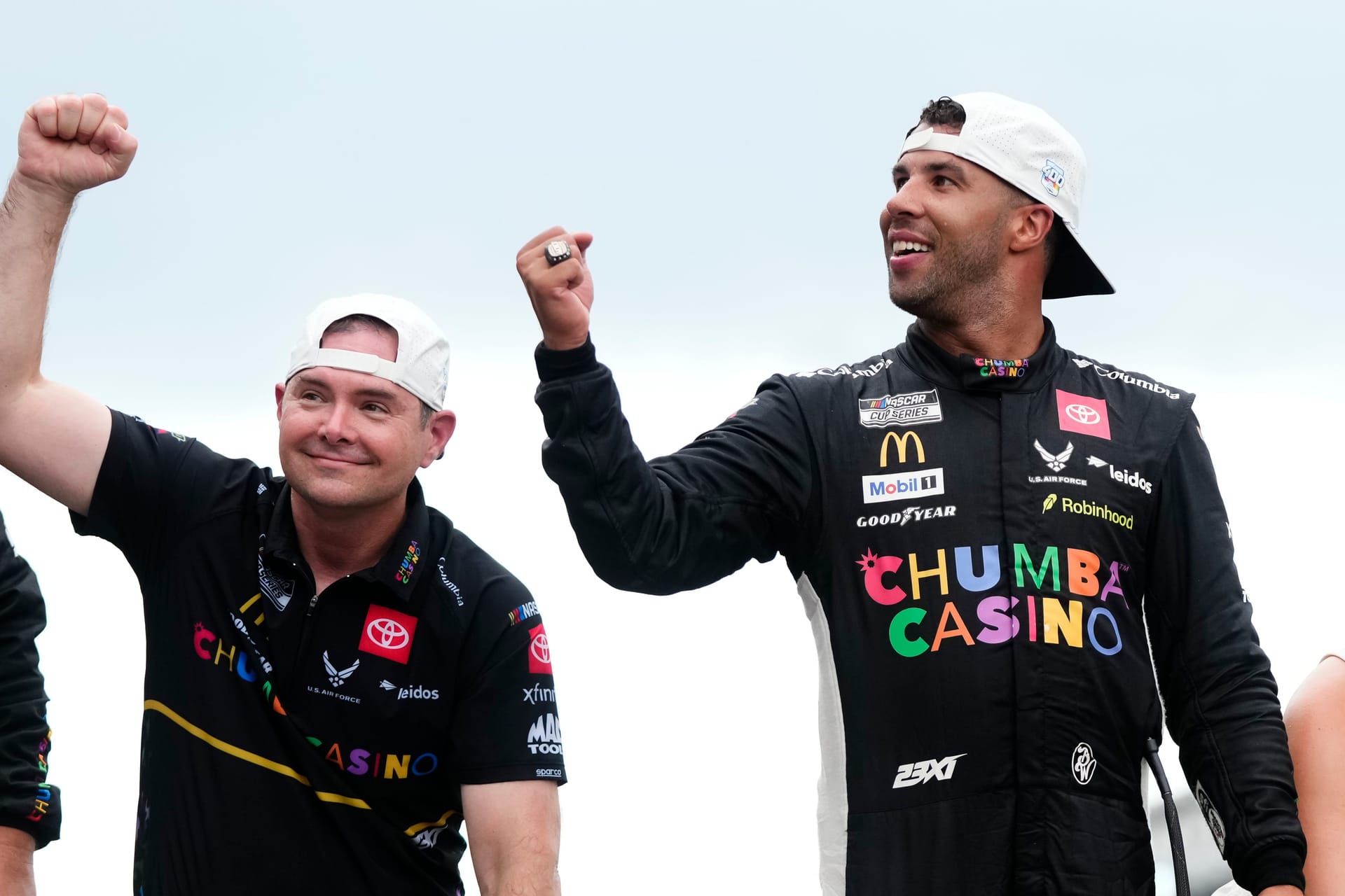 Charles Denike and Bubba Wallace celebrate the Brickyard 400. Source: Imagn