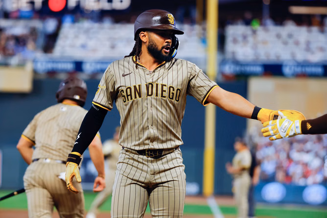 “Guess he needed an excuse” - Fans rip Fernando Tatis Jr. as shortstop exits game with apparent injury vs. Twins