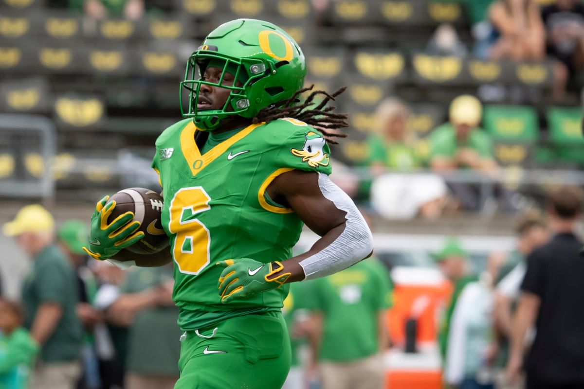 WATCH: Oregon RB Noah Whittington fires up crowd with sensational 59 yard TD run in opening minute against Oklahoma State
