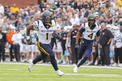 Jahiem White injury update: WVU coach Rich Rodriguez provides major news on star RB after being carted off the field