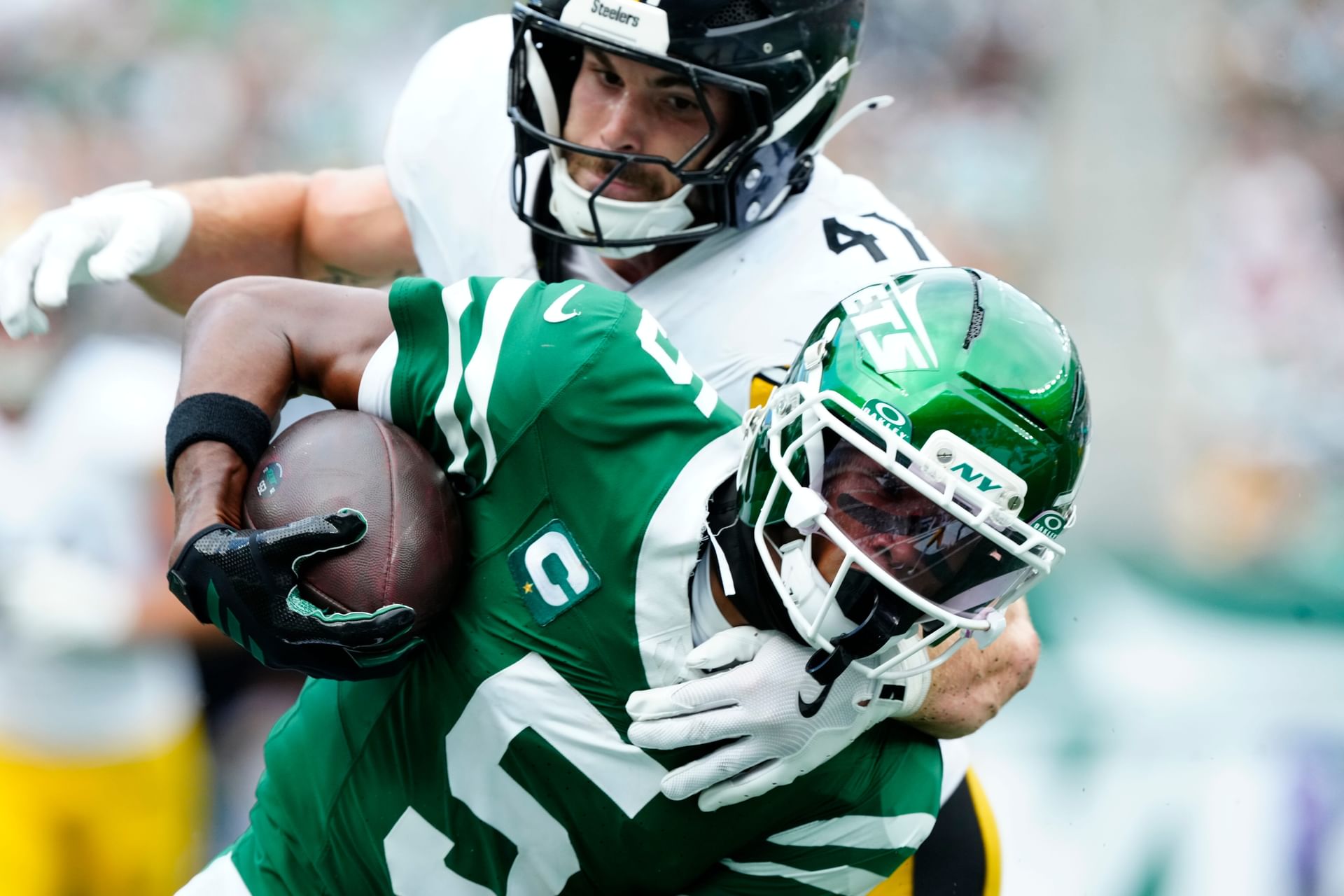 Garrett Wilson gets tackled by Pittsburgh Steelers defender Payton Wilson - Source: Imagn
