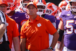 "Karma is coming back to this university": CFB fans troll Dabo Swinney's team after Clemson bus rams into a light pole before arrival