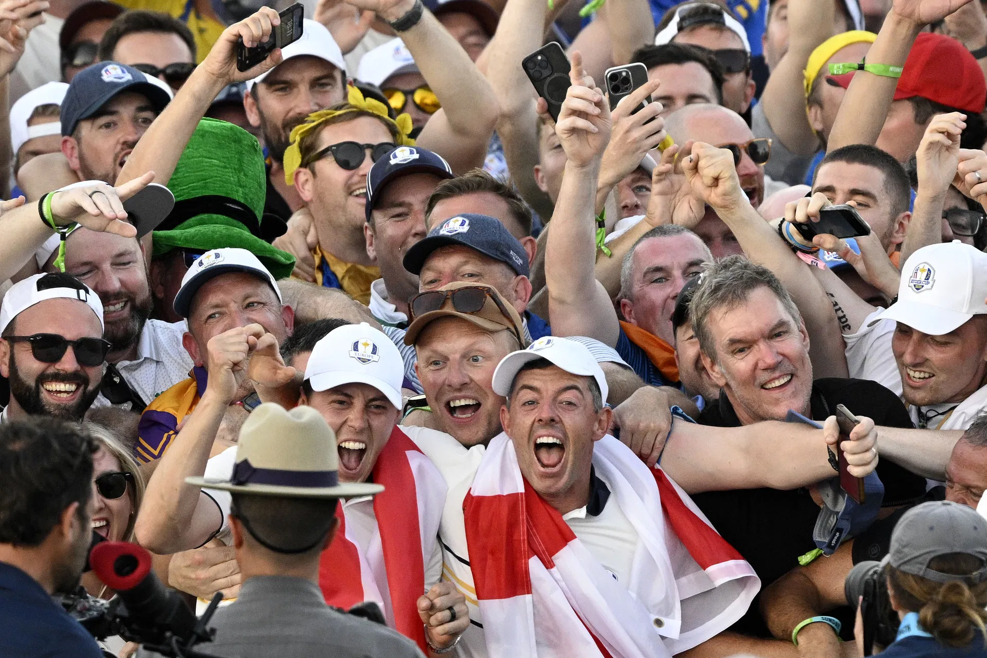 Rory McIlroy celebrates the Ryder Cup 2025 win with fans (Image Source: Imagn)