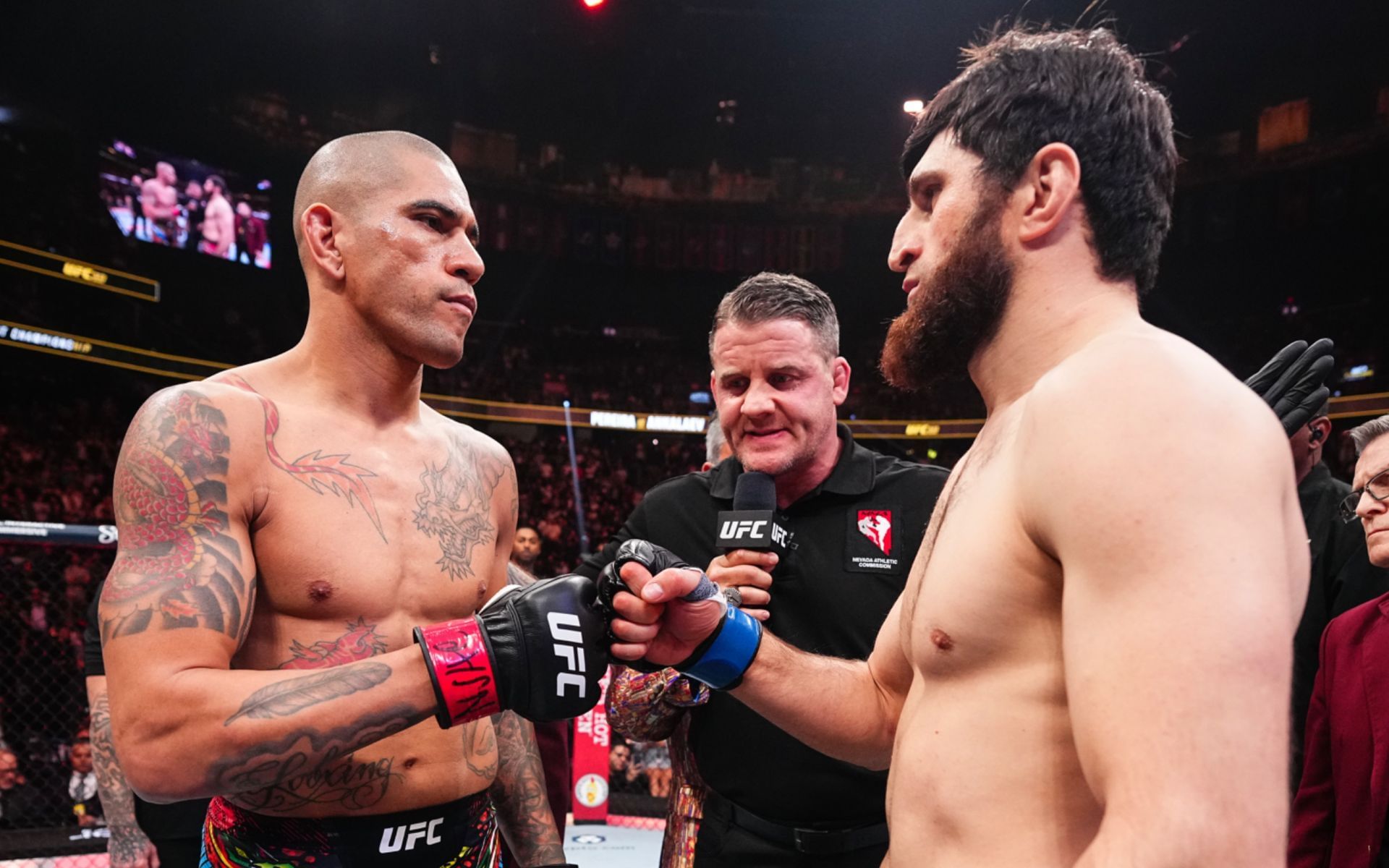 Magomed Ankalaev (right) goes off on Alex Pereira (left). [Image courtesy: Getty Images]