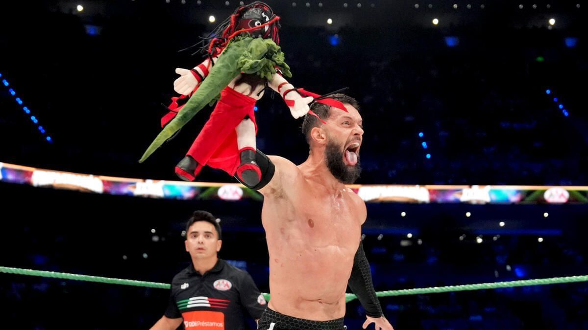 Finn Balor with Demonito and La Yesca. (Photo: WWE.com)