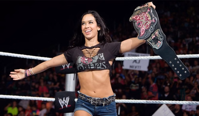 Why did AJ Lee leave WWE?