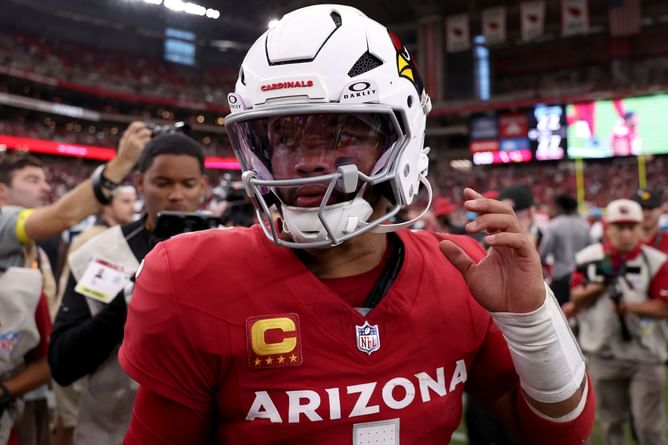 Cardinals' Kyler Murray apologizes for wearing a Michael Vick jersey while posing with his Pitbull
