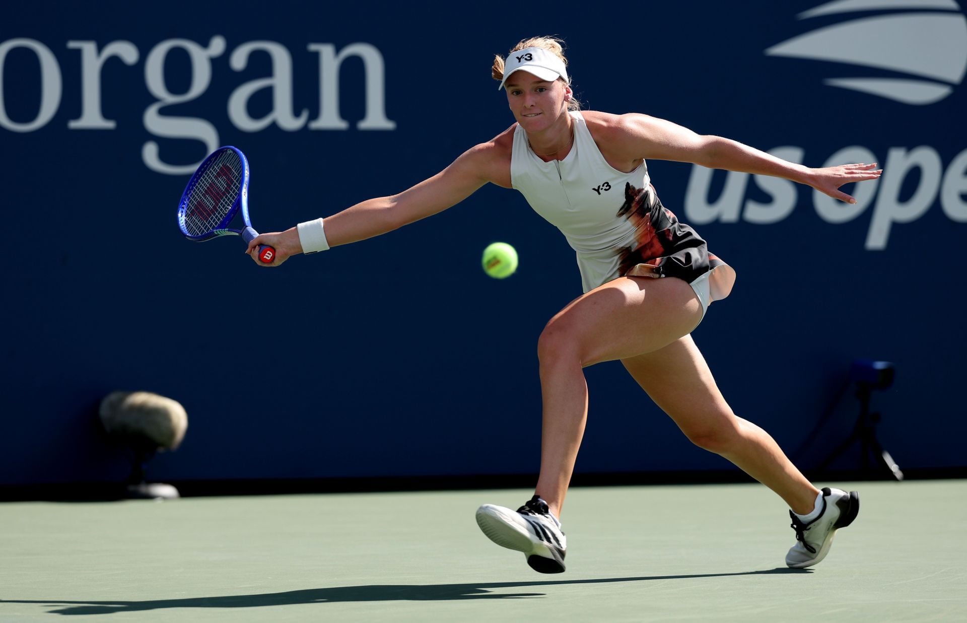 Ashlyn Krueger tracks down a ball at US Open | Image Source: Getty