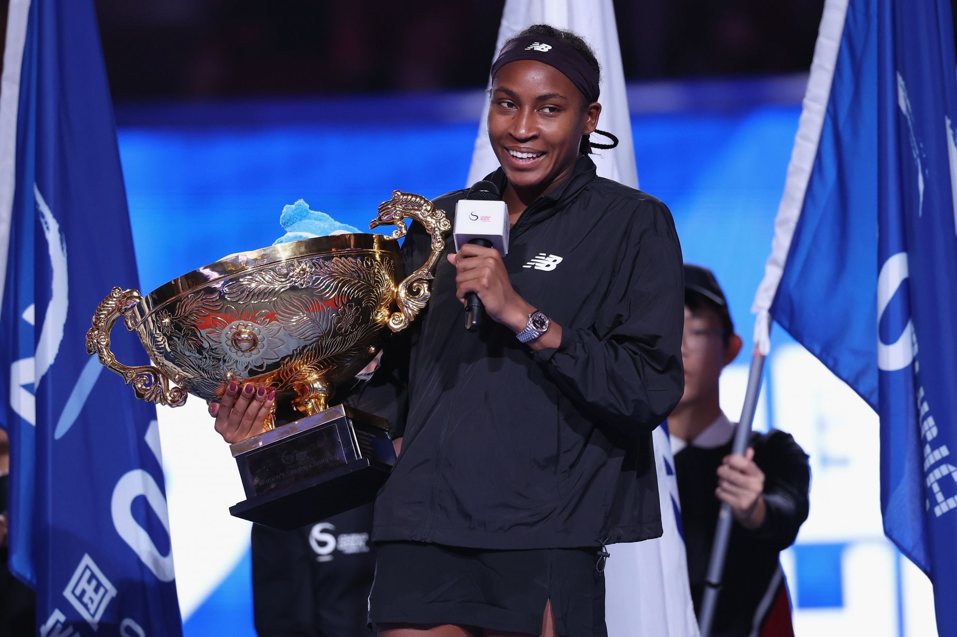 Coco Gauff poses with the 2024 China Open title | Image Source: Getty