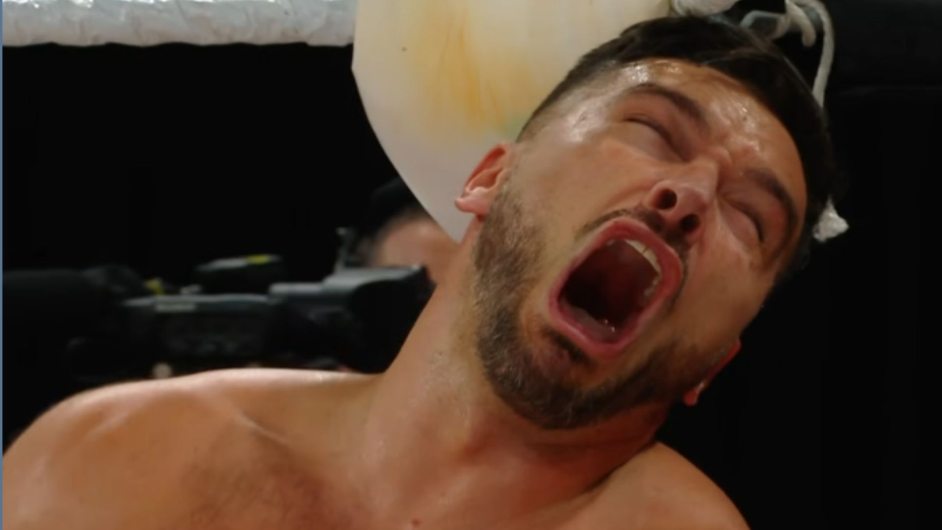 Ethan Page was left in pain as well, screaming as JD McDonagh fell on a tender region (Credit: WWE on YouTube)