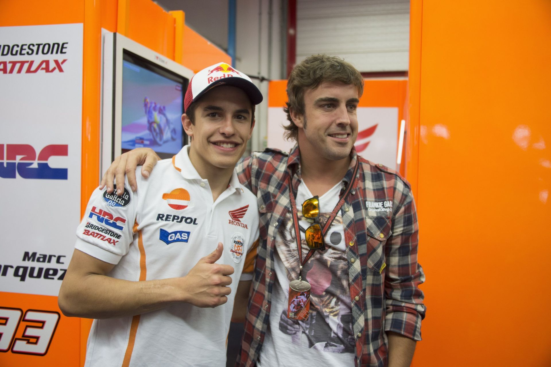 Marc Marquez (L) and Fernando Alonso (R) at the 2014 MotoGP of Italy - Source: Getty