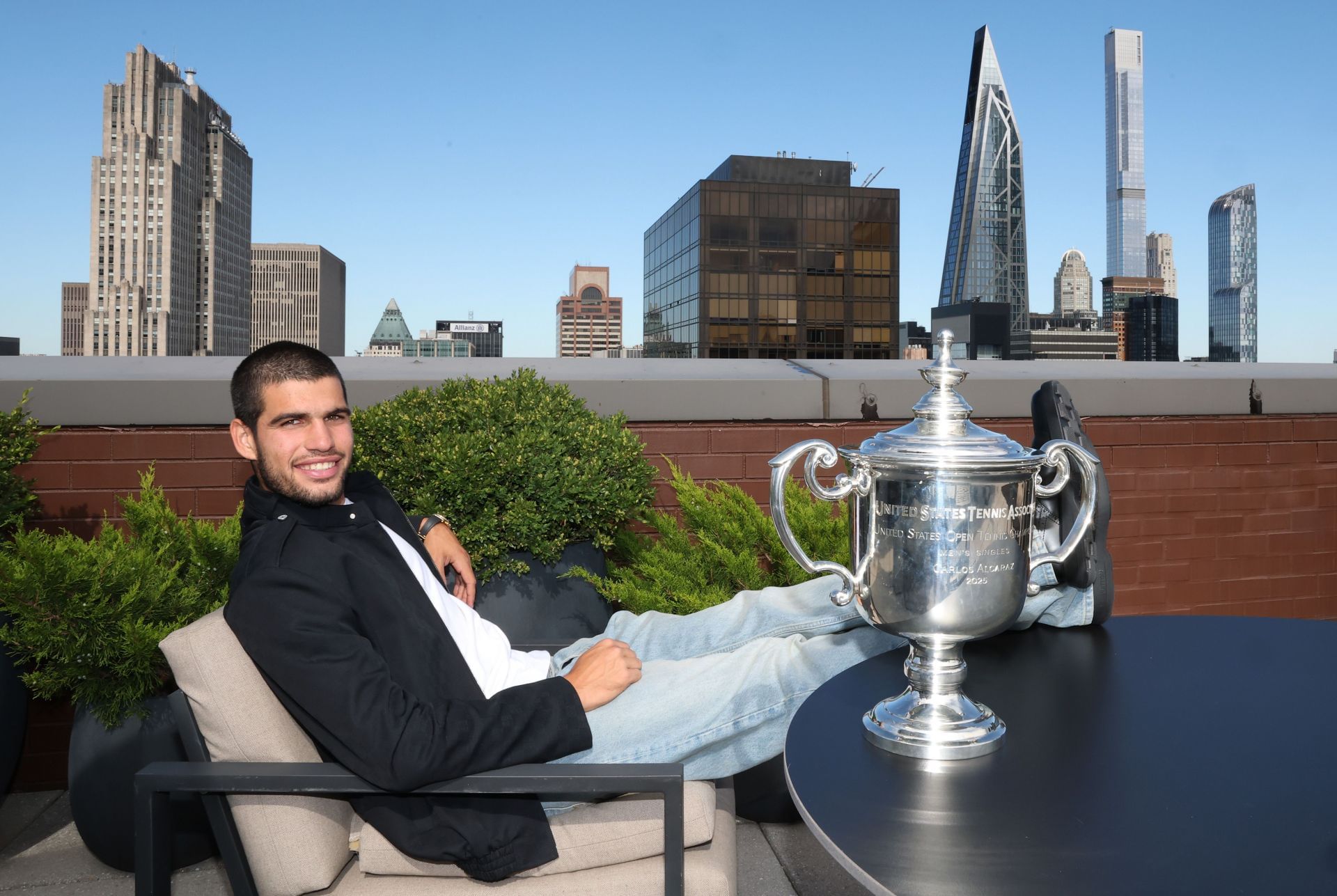 Carlos Alcaraz poses during post-US Open press tour | Image Source: Getty