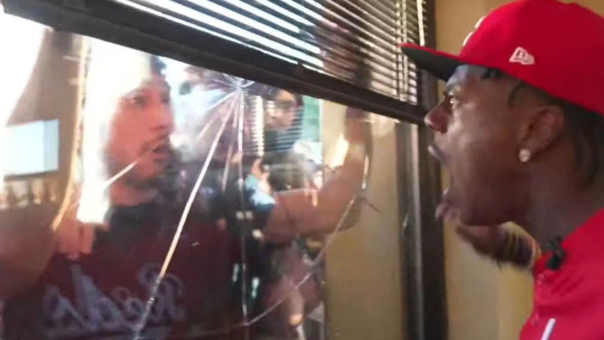 IShowSpeed was seen attempting to chase a man who broke a glass window of a store he was in (Image via IShowSpeed/YouTube)