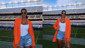 Evan Engram’s wife Emily steals spotlight with bold orange blazer and denim shorts for Broncos vs. Titans Week 1 game