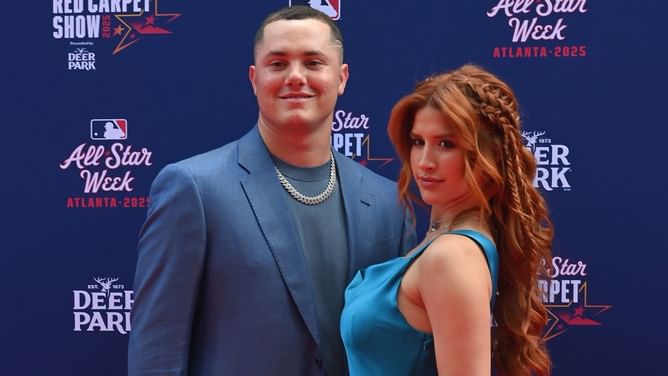 Adrian Morejon’s wife Melany gets playful as she slides down Padres star's life-size poster in red bralette and skirt