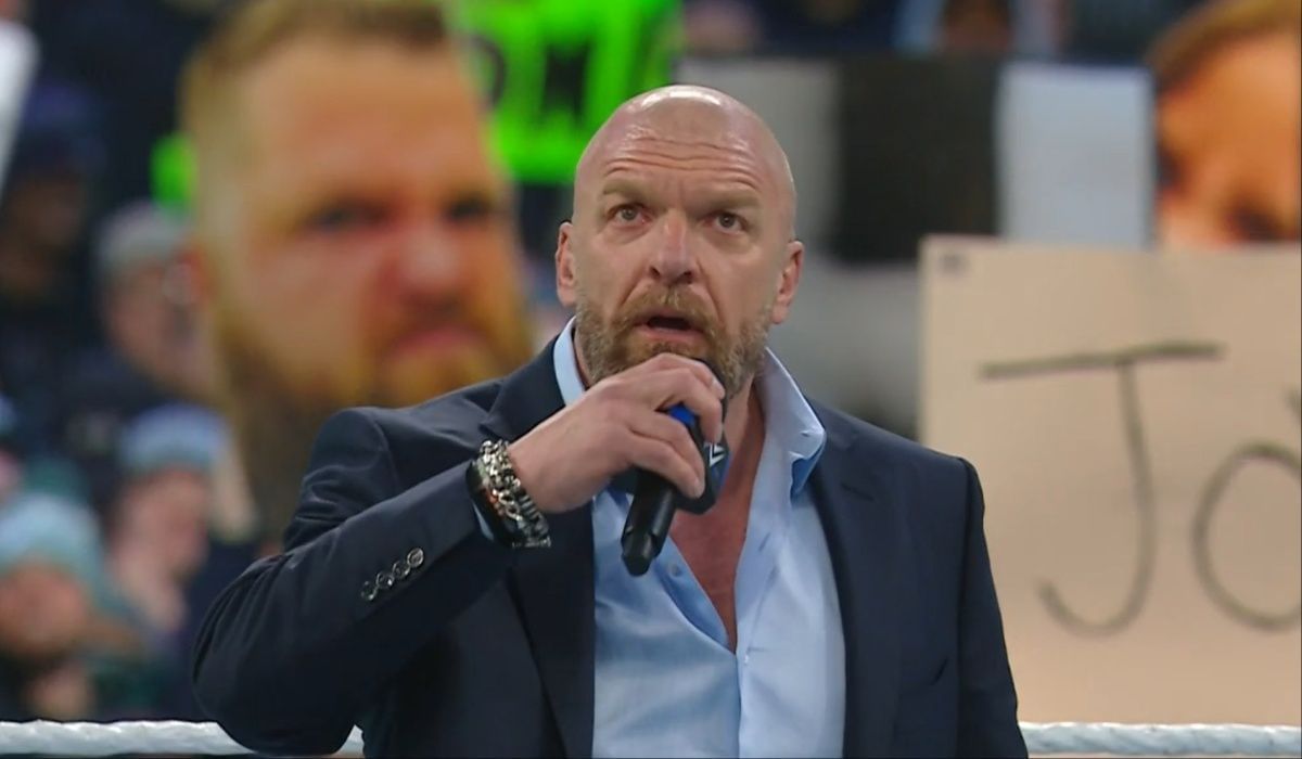 Triple H slammed by veteran. (Image via WWE.com)