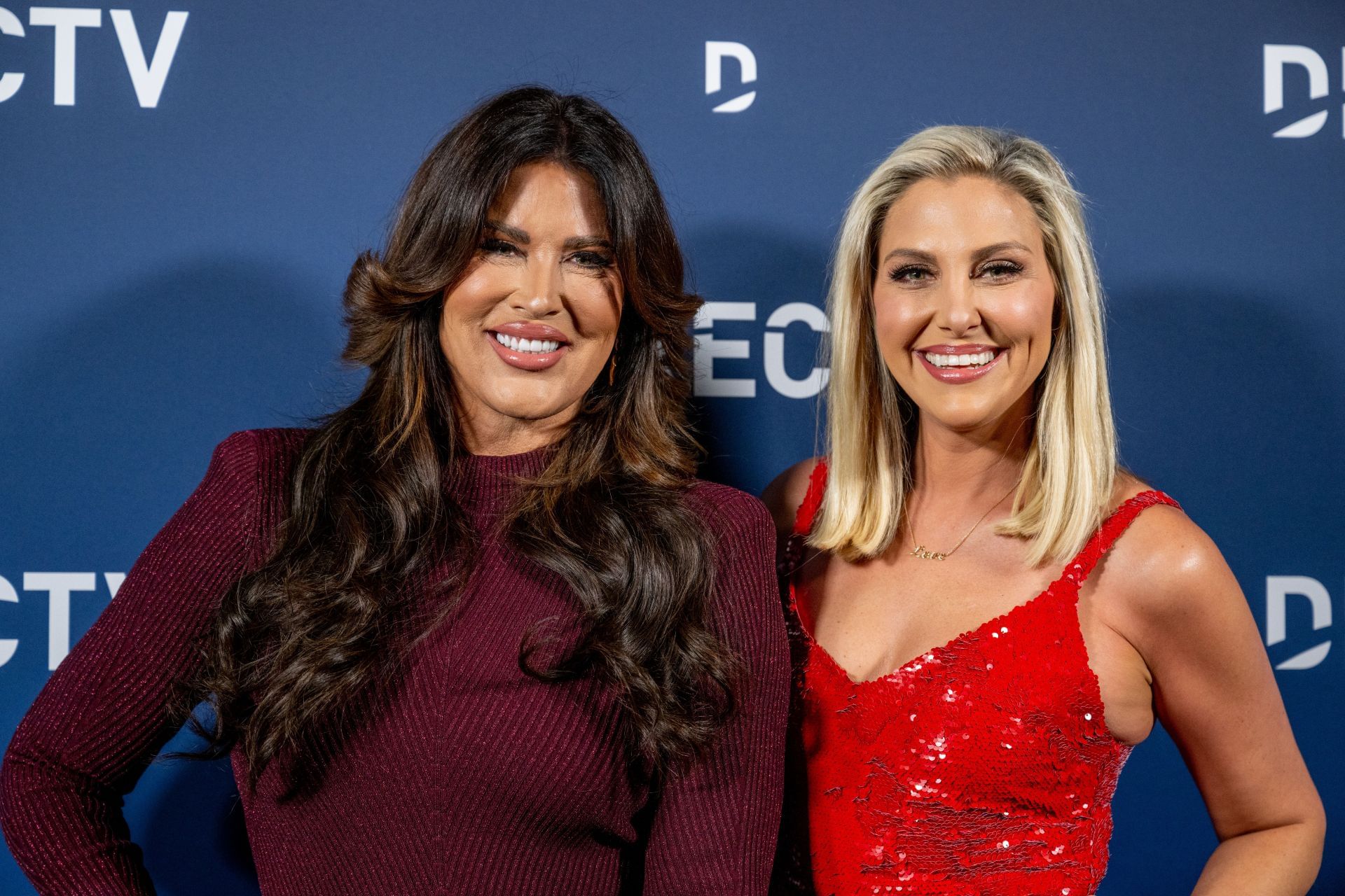 Television personalities Emily Simpson (L) and Gina Kirschenheiter (R) attend DIRECTV&#039;s Christmas At Kathy&#039;s 2024 (Image via Getty)