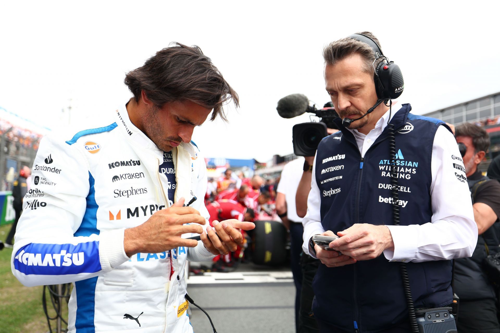 Carlos Sainz [L] and his race engineer Gaetan Jego [R] at the 2025 F1 Grand Prix of the Netherlands - Source: Getty