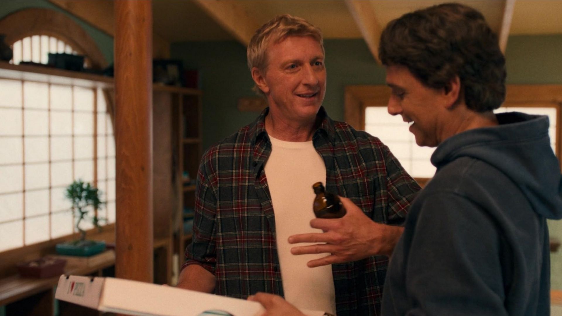  Johnny Lawrence reunites with Daniel LaRusso in Karate Kid: Legends cameo scene. (Image via Prime Video)