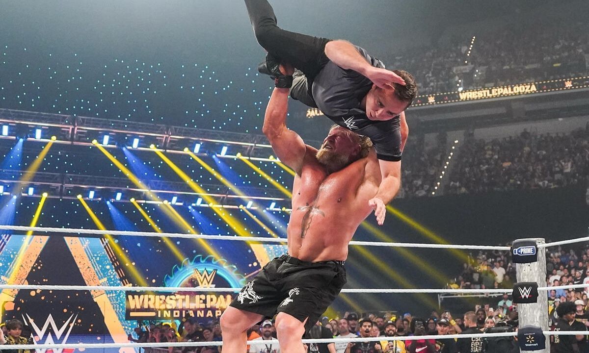 Brock Lesnar giving an F5 to a match referee after beating John Cena at Wrestlepalooza. [Photo credit: WWE.com]