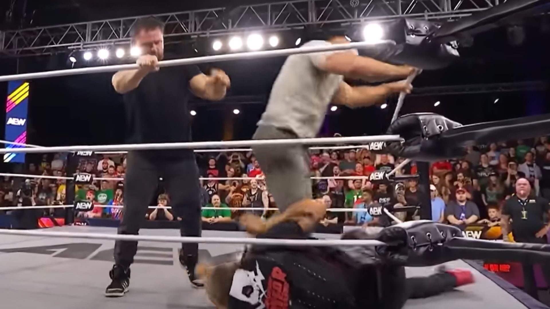 FTR attacks Adam Copeland [Source: AEW on YouTube]