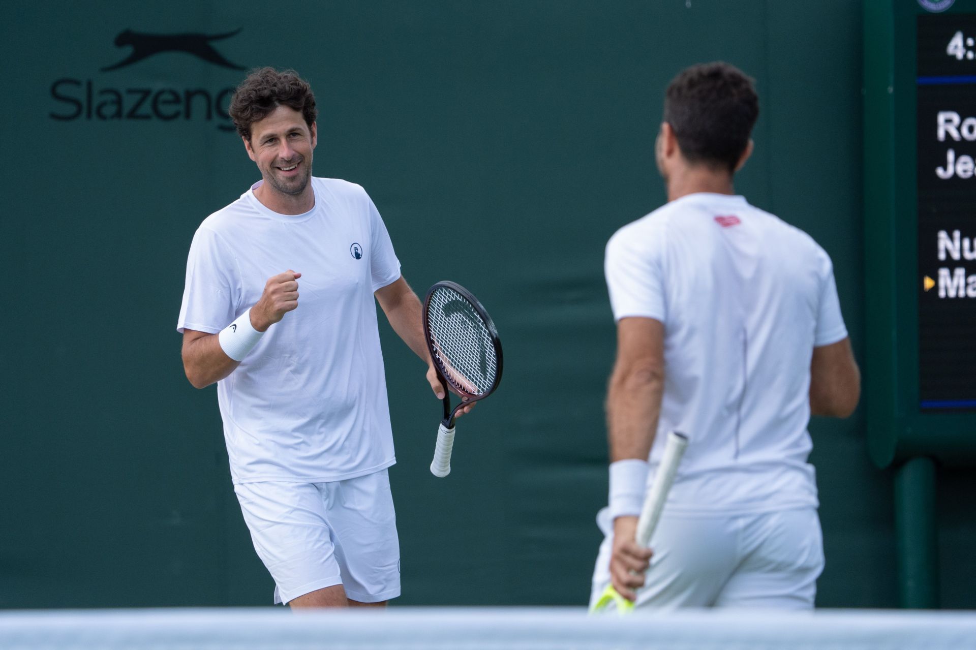 Good friends Robin Haase and Jean Julien-Rojer face off in Chengdu Open doubles | Image Source: Getty