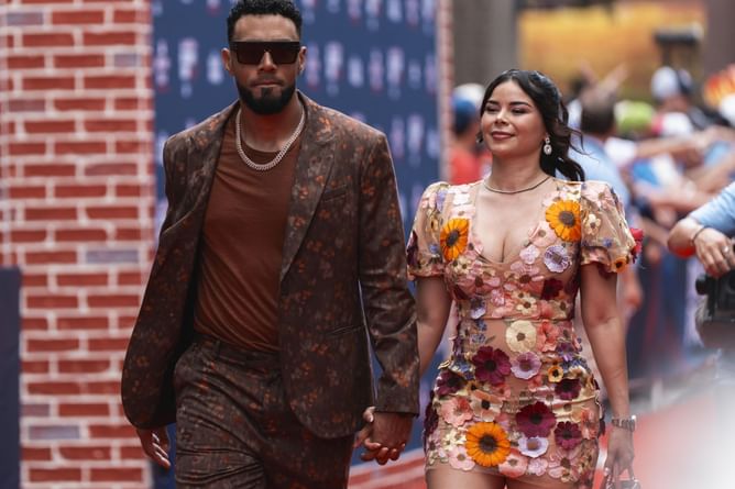 Robert Suarez's wife Noemi turns up glamor in a golden yellow jacket, skirt and off-white boots on New York date night with the Padres star