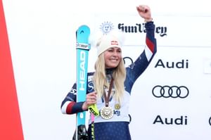 Lindsey Vonn poses in red bikini during lake recovery at 2026 ski pre-season camp in Chile