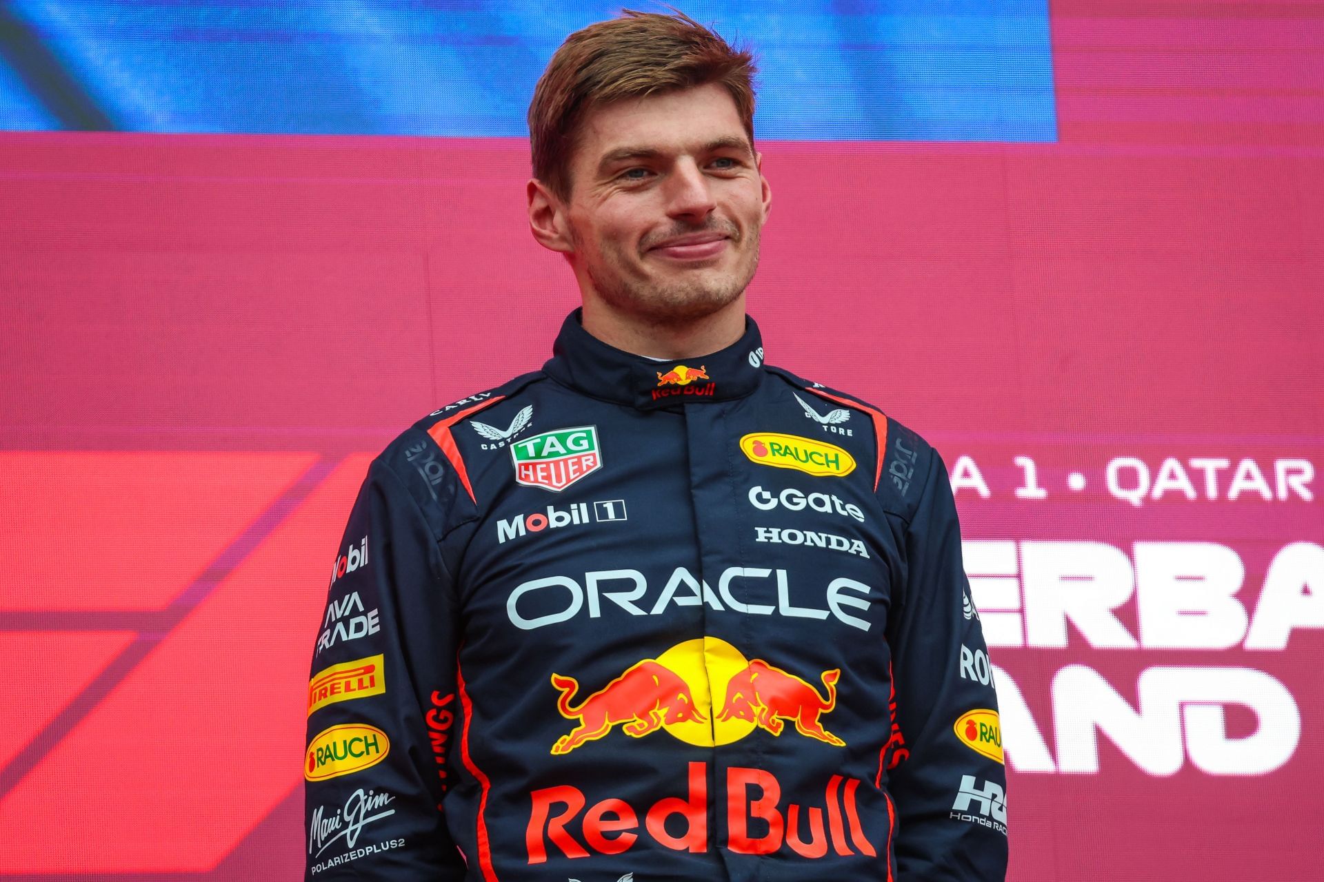 Red Bull&#039;s Max Verstappen standing atop the podium at the 2025 F1 Grand Prix of Azerbaijan after winning the race - Source: Getty