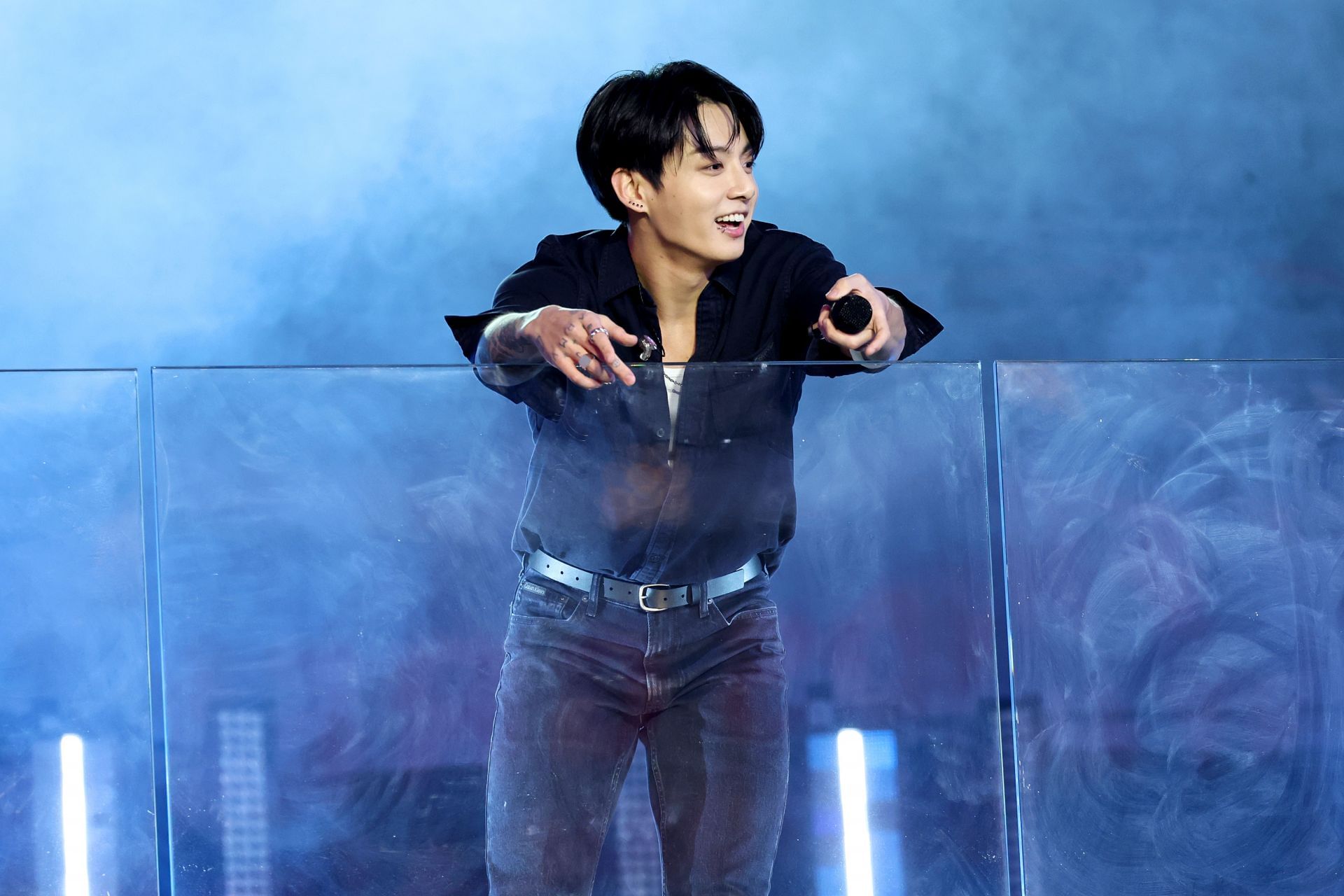Jungkook performing at TSX, Times Square (Image via Getty)