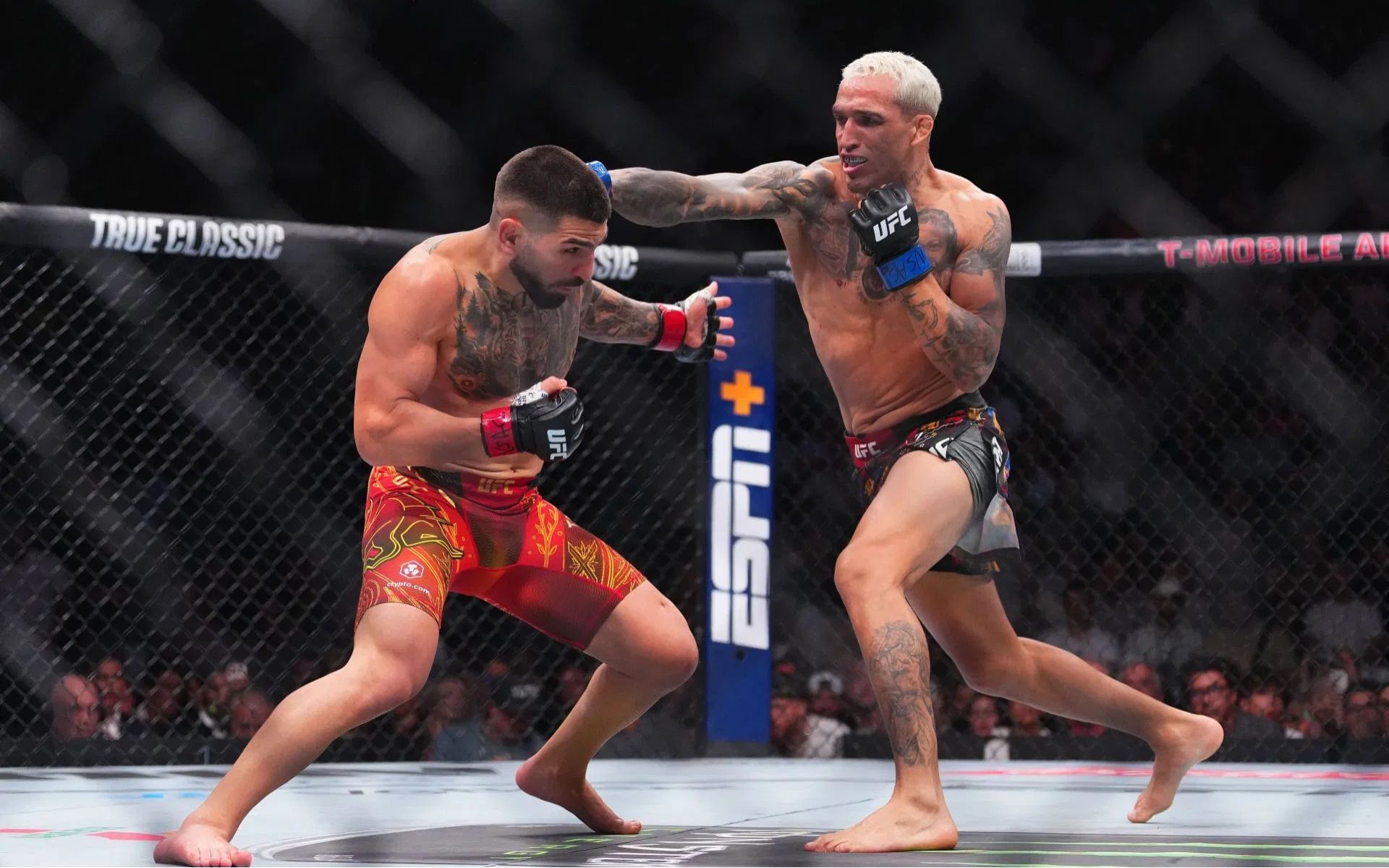 Charles Oliveira (right) talks about his loss against Ilia Topuria (left). [Image courtesy: Getty]